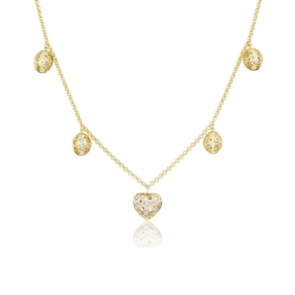 A gold necklace with five hearts hanging from it.