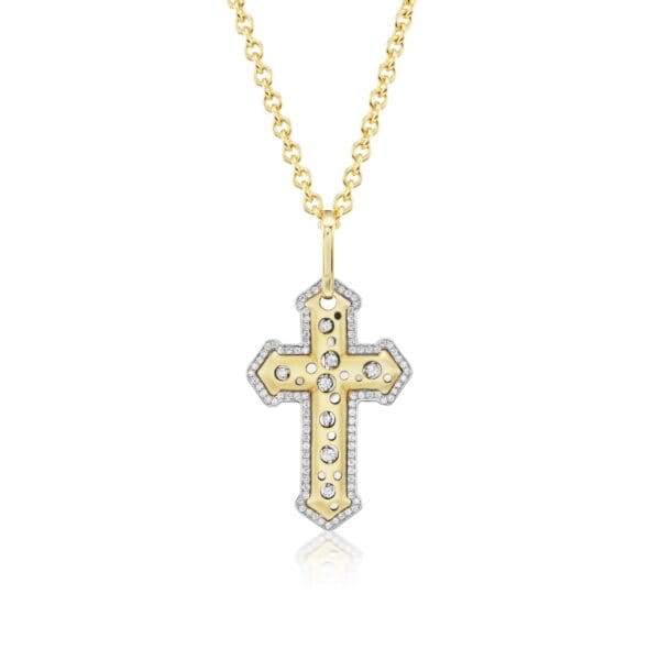 A cross is shown with a diamond on it.