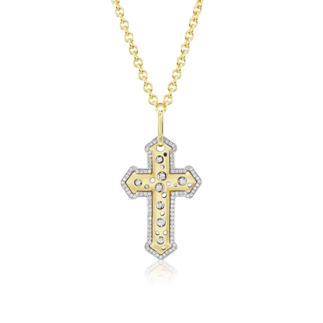 A cross is shown with a diamond on it.