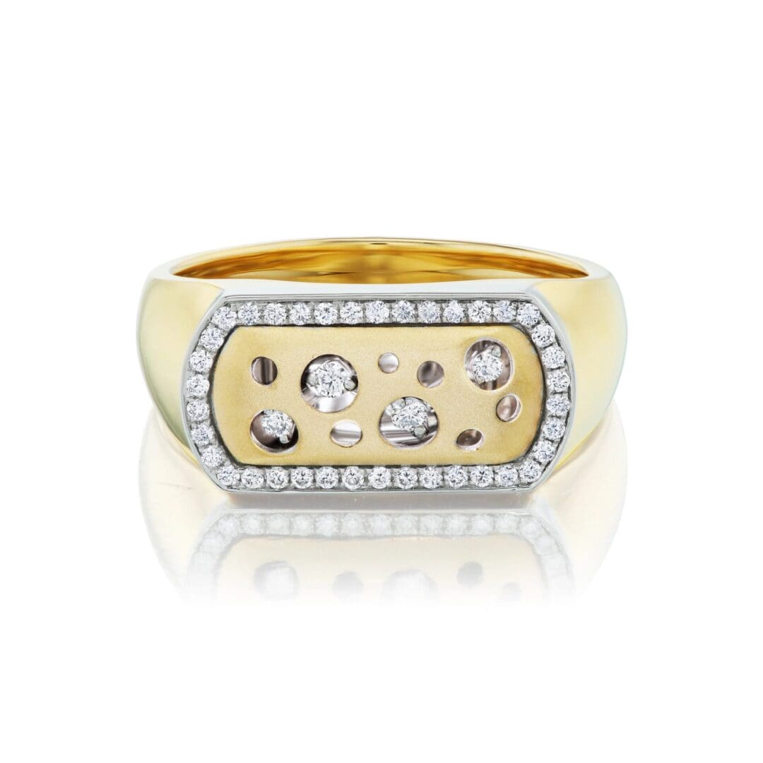 A gold ring with diamonds on top of it.