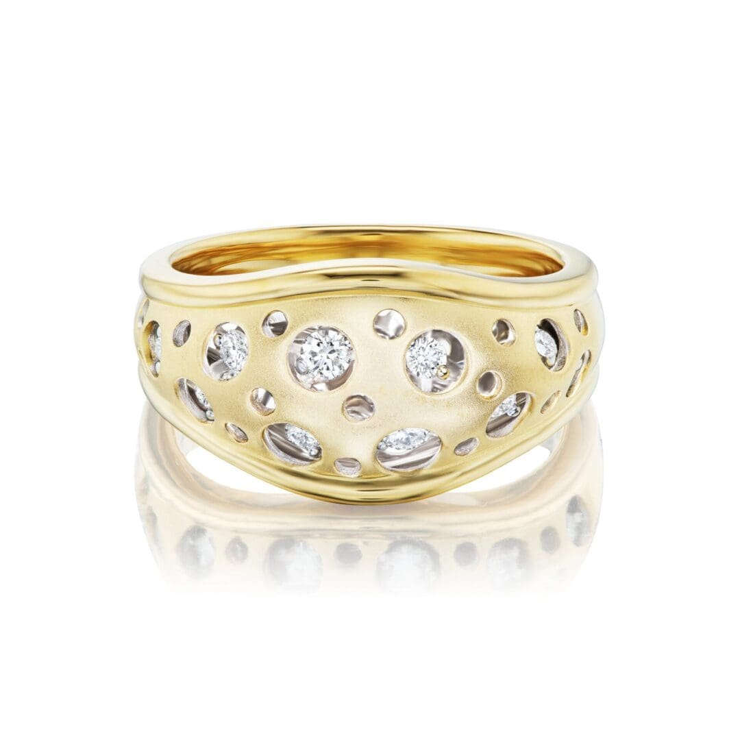 A gold ring with diamonds on it's side.